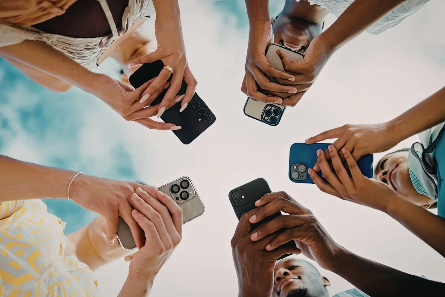 people on their mobile phones