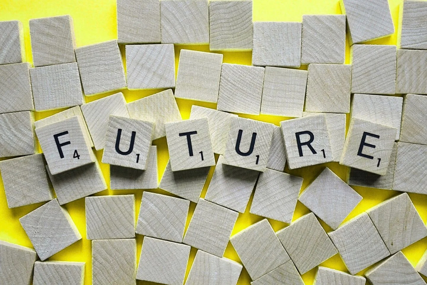 Scrabble blocks spelling out "FUTURE"